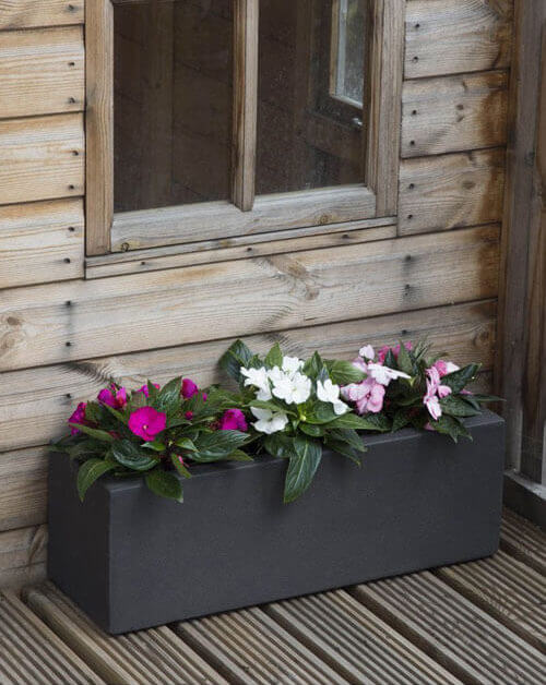 Large GRC Planter with different types of plants