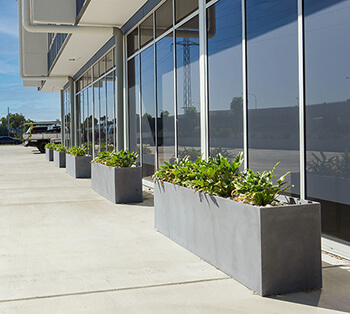 milano concrete trough planters at huntress warehouse QLD