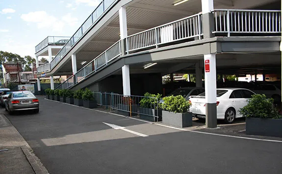 IOTA Granite Planters in parking lot in Bankstown