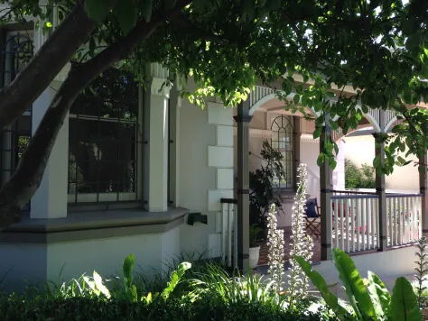 Ever wondered what a horticulturalist's home would look like? Here is a view of the front of her house which obviously has a wonderful garden, because why not? She loves plants.