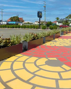 Outdoor Rectangular Planters Lined up in a Parking Area